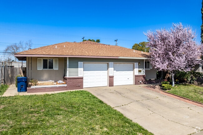 This duplex is separated by the garages with side entrances in White Rock.