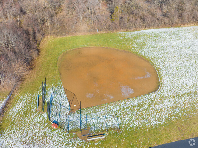 The Union Elementary School has a baseball field near the back of the building.