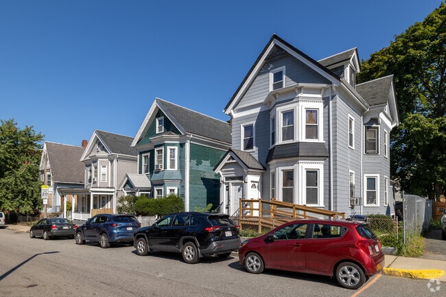 Rows of triple decker homes line the streets of Washington Park.