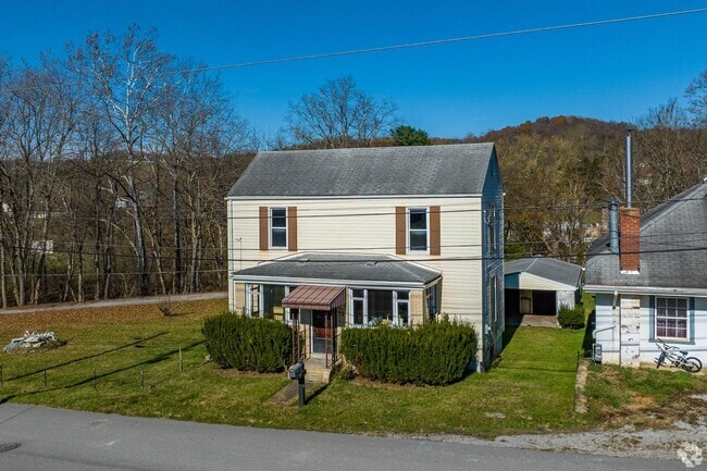 A traditional American Four Square home is a staple in the rural Avella area.