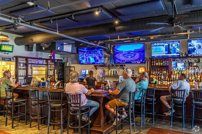 Enjoy some drinks and sports games at Shopper's Cafe near Bentley College.