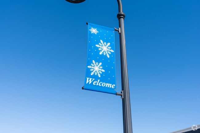 Main St sidewalk light pole sign