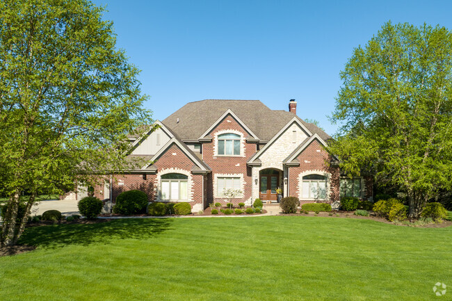 Luxurious traditional style homes with mixed brickwork can be seen in Wayne neighborhoods.