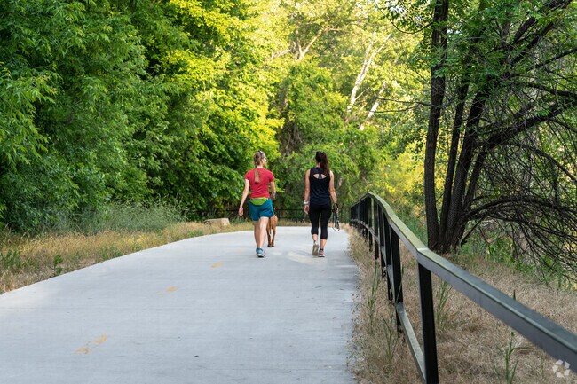 Veterans Park in Boise, ID is home to active people who walk their dogs.