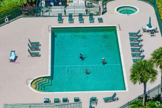 Many residents enjoy the community pool at the golf club.
