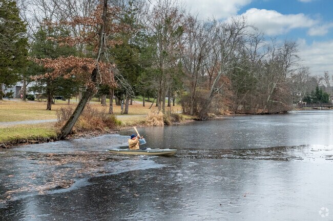 Residents enjoy boating on the peaceful waters of Packanack Lake.