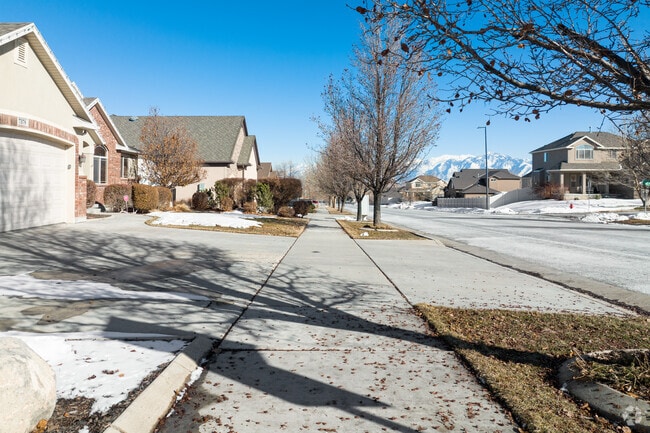 Residents can enjoy spacious sidewalks in the Jordan Hills neighborhood for an afternoon walk.