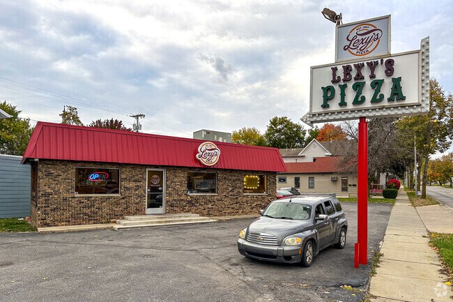 Indulging in a slice of heaven at Lexy's Pizza in Hamilton, located off Main St.