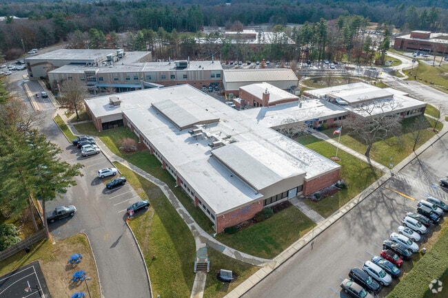 Aerial view: Green surroundings, modern facilities at Foxborough Regional Charter School.
