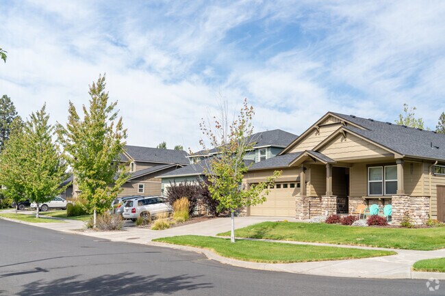 A charming row of homes in Southwest Bend, each with unique colors and welcoming front porches.
