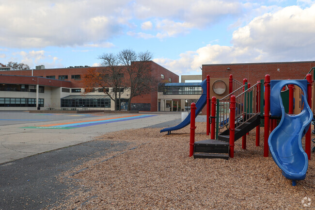 Students at Frost Middle School enjoy recess on the playground.