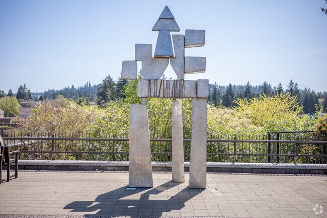 Public art in Evergreen's Millennium Plaza Park.