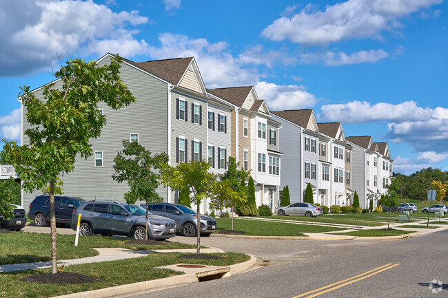Large 3 story townhomes are another housing option in Collegiate acres.