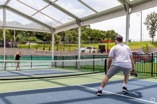 Deer Ridge residents enjoy outdoor activities such as Pickleball.