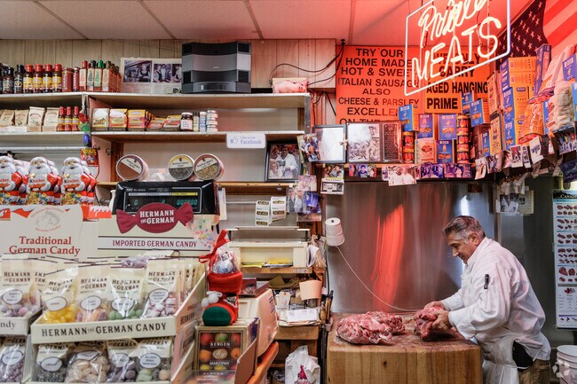 Watch Porchetta being prepared fresh at Karl Ehmer.