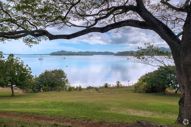 Boats can be seen sailing in the distance from Kaneohe's He'eia State Park.