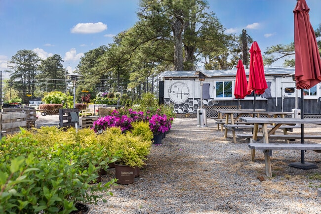 The Hive Cafe & Farmbar, minutes from Caroon Farms, offers outdoor patio seating and fresh eats.