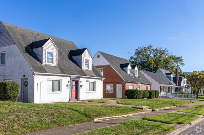 A row of Cape Cod inspired homes in the Enslow Park neighborhood in Huntington, WV.
