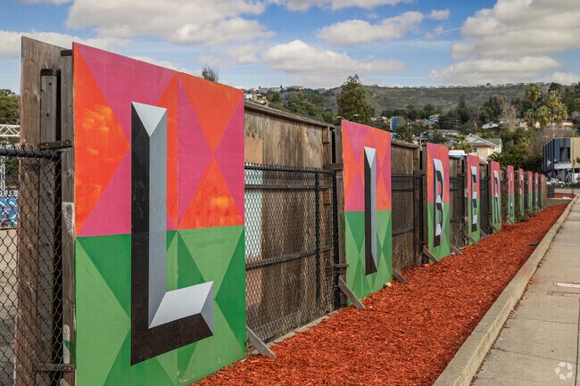 Havenscourt's Liberation Park features large colorful signs spelling its name.