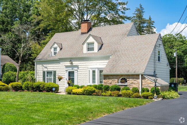 Adorable craftsman homes with dormer windows are found in Purchase.