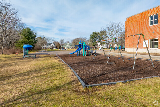 Students can enjoy swings at Alcott Elementary School in Concord.