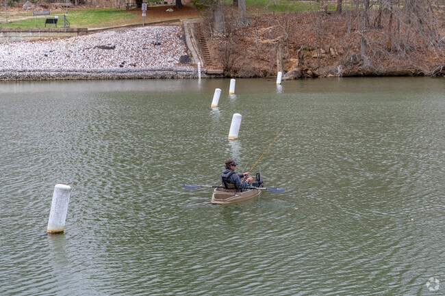 Take out a kayak and fish on the Lake at Lake Roland Park in Baltimore, Maryland.