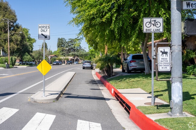 As residents stroll through Rancho Riverside, they encounter these charming signs that remind all to share the road with our equestrian friends.