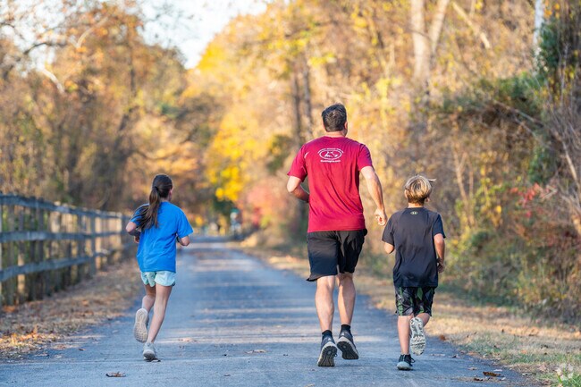 Families enjoy exercising together on the Saucon Rail Trail.