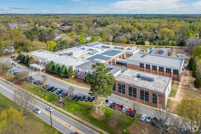Beacon Hill Middle School boasts an expansive and contemporary campus, featuring lush green spaces, state-of-the-art facilities, and an atmosphere that fosters learning and community engagement.