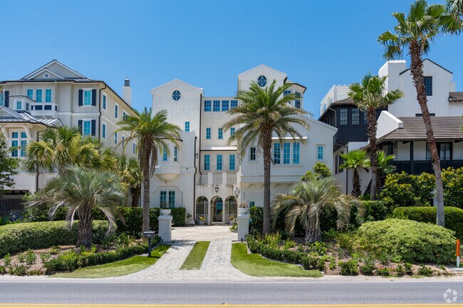 The homes in Seaside have manicured lawns with lush landscaoing.