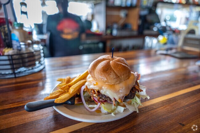 Try the delicious burgers served at Tugboat Annie's in West Bay Drive.