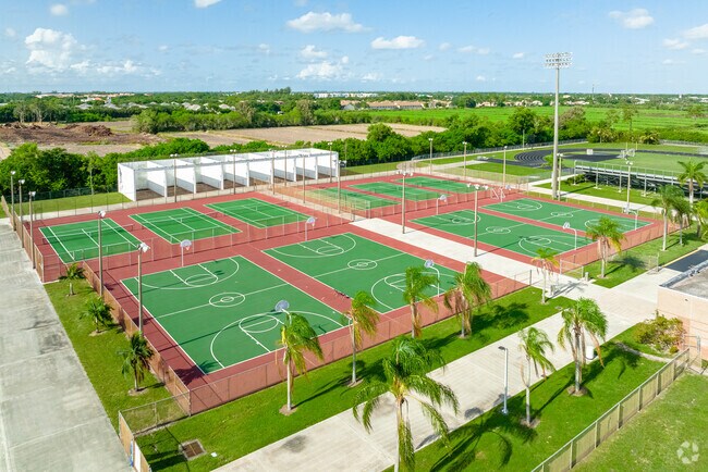 Olympic Heights High offers basketball and tennis courts for students living in The Oaks.