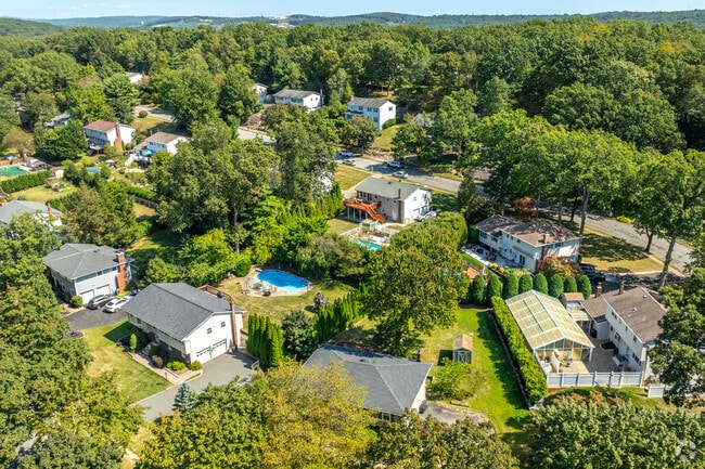 Roxbury’s residential streets are surrounded by greenery and wooded areas.