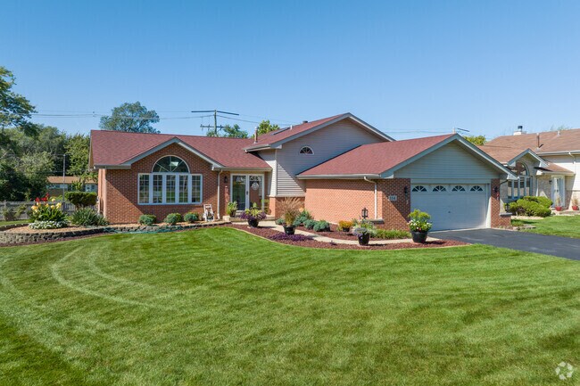 Residents take pride in maintaining their lawns in North End.