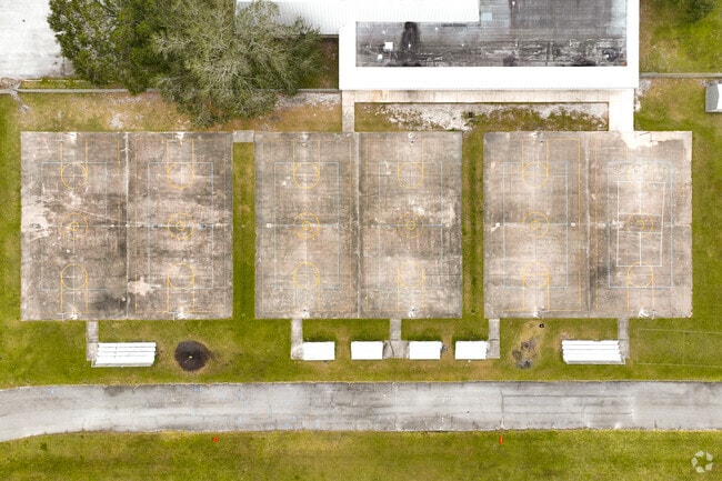 Southwest Middle School features various outdoor sports courts for students to play on.