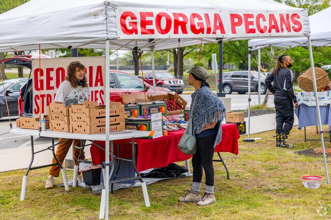East Point Farmers Market offers a variety of goods, including fresh strawberries and pecans.