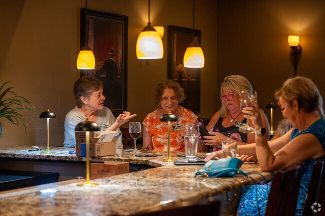 Villages residents gather at GarVino's Wine and Cigar Lounge nearby the Village of Belvedere.