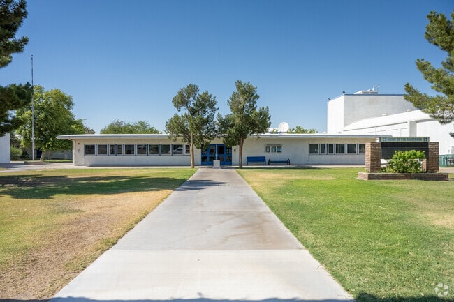 A view of the Needles High School buildings from the street.