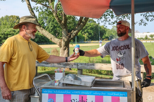 On hot summer days, the Nice Ice Baby Italian ice vendors bring cool, refreshing treats to parks in Groveland and Haverhill, delighting families and park goers alike.