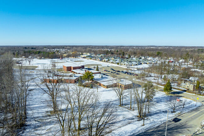 A wooded student recreation area can be found behind Linden Elementary School.