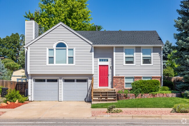 Multi-level home with a two car garage in the Ralston Valley neighborhood.