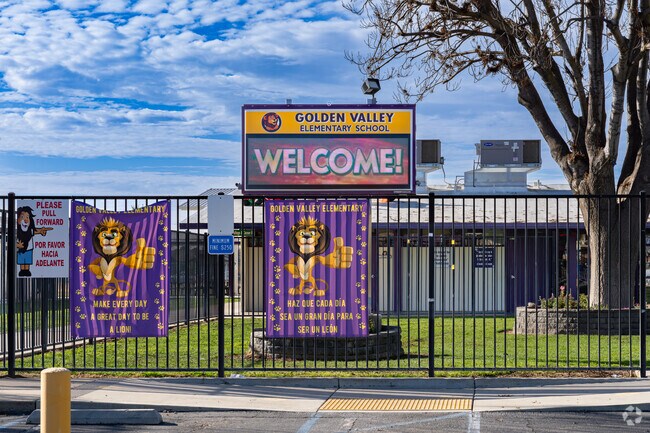 A large lighted marquee welcomes students to the entrance to Golden Valley Elementary School.