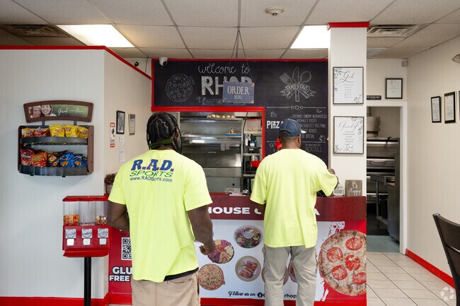 Locals order food at RHOP Pizza, a popular spot along Route 44 in Rehoboth.