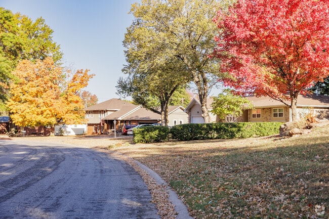 The homes of College Skyline are surrounded by large, mature trees.