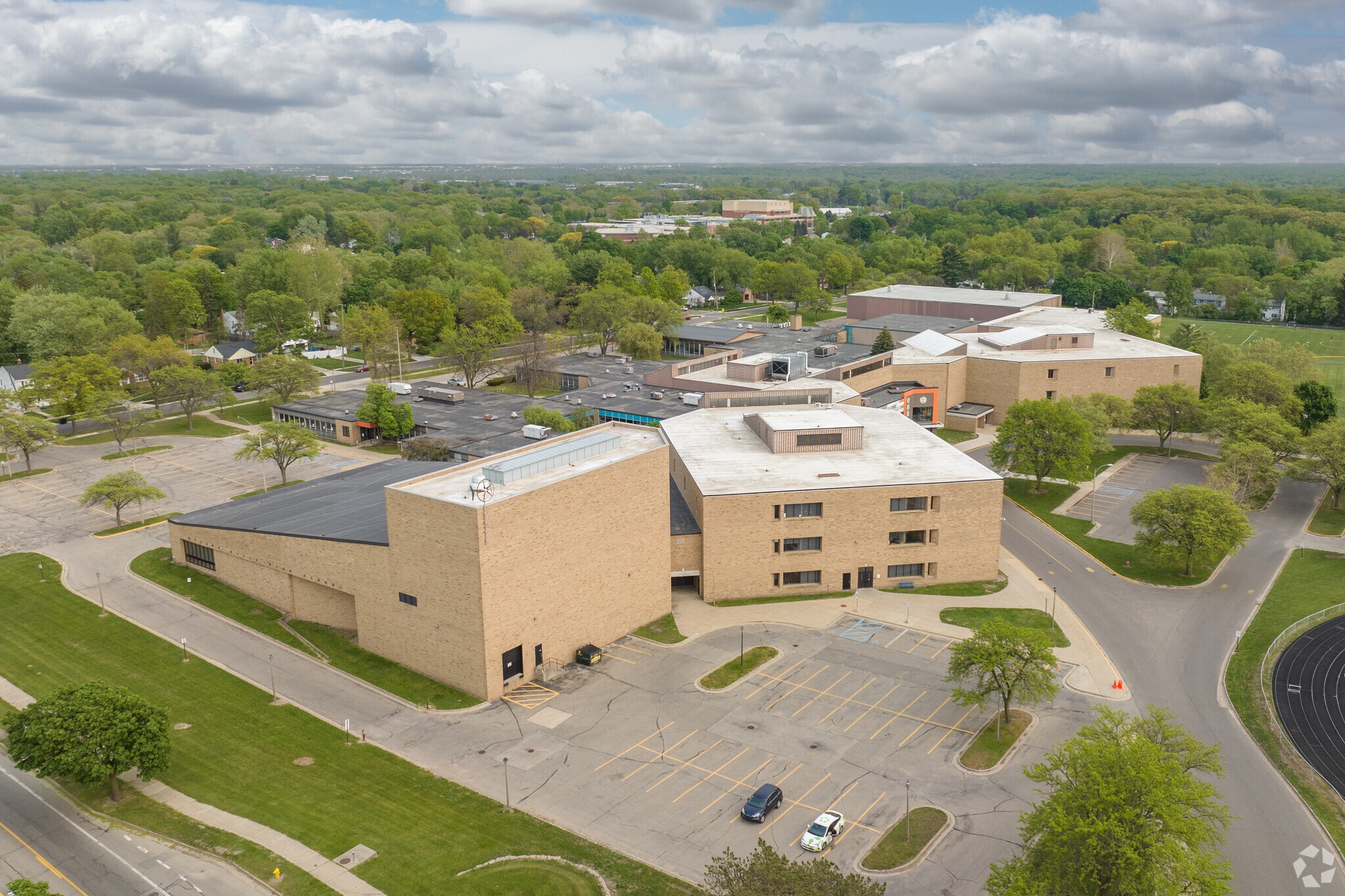 Aerial overview of Ottawa Hills High school on Burton St covering South Hills.