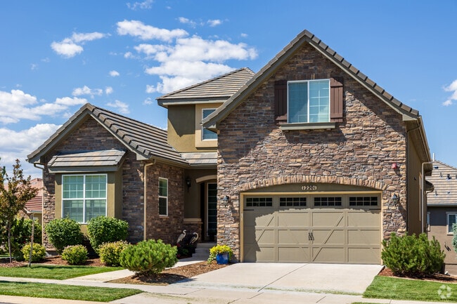 Ranch homes with mountain views feature a spacious main level primary bedroom.