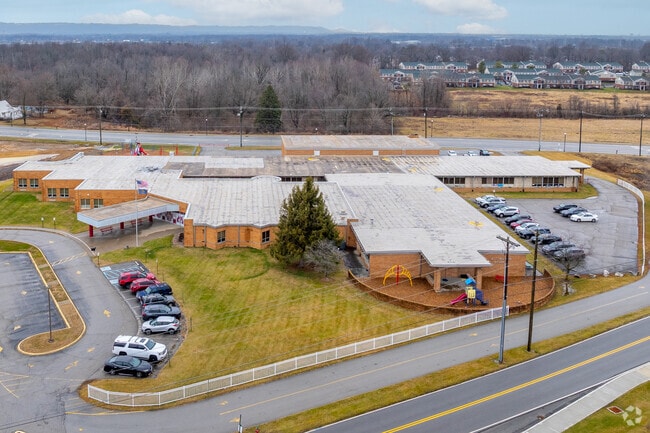 32% of students at W E Wilson Elementary are proficient in reading.