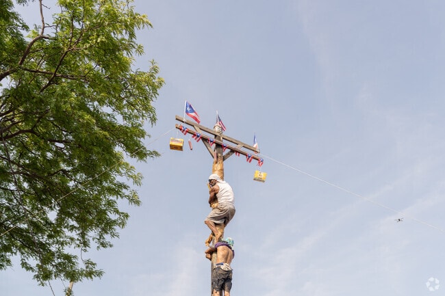 The Grease Pole Festival near Broadway-Fillmore is a Puerto Rican tradition.