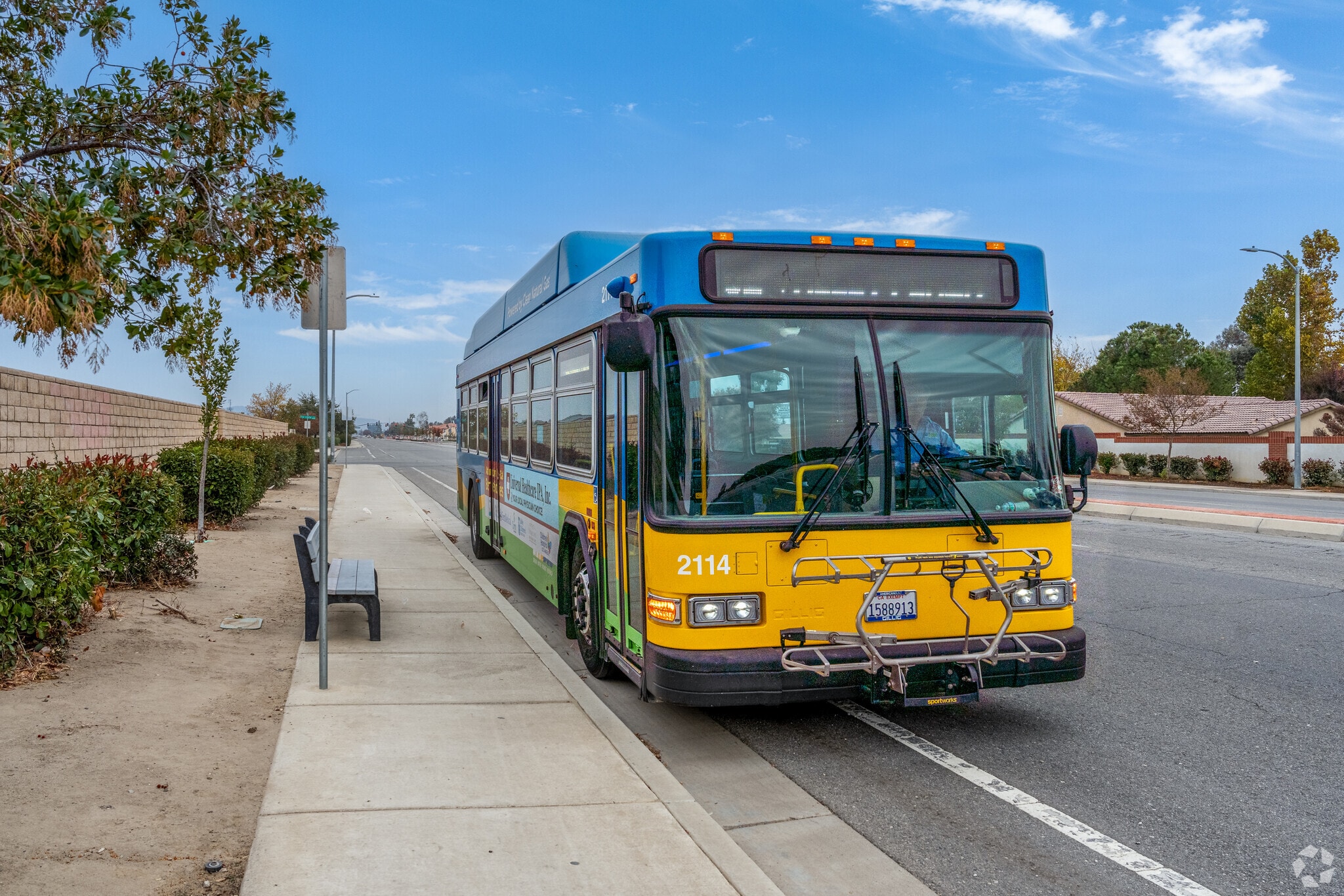 Residents can catch the bus along the edge of town on Stine Road in Panama.