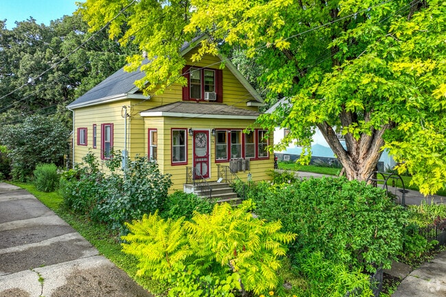 This modest home in Horace Mann is tucked away in the lush greenery.